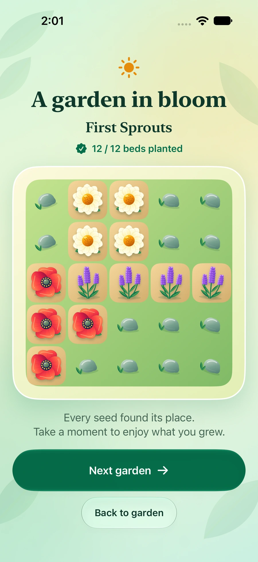 First Sprouts completed garden with all 12 beds filled by colorful flowers.